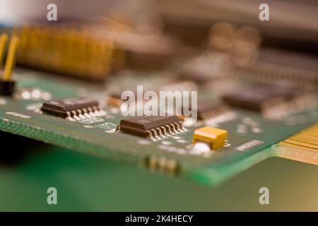 Green computer circuit board with microchips. Stock Photo
