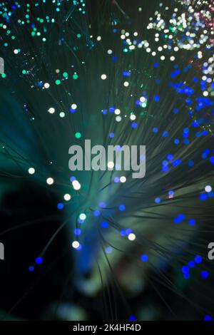 Illuminated fibre optic strands. Stock Photo