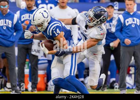 Tennessee Titans cornerback Caleb Farley (3) attempts to tackle Buffalo  Bills wide receiver Stefon Diggs (14) during an NFL football game, Monday,  Sept. 19, 2022, in Orchard Park, N.Y. (AP Photo/Kirk Irwin