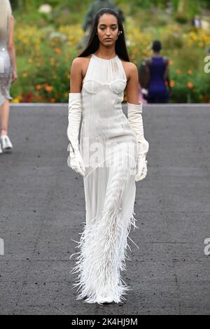 Mona Tougaard walks on the runway during the Louis Vuitton Resort