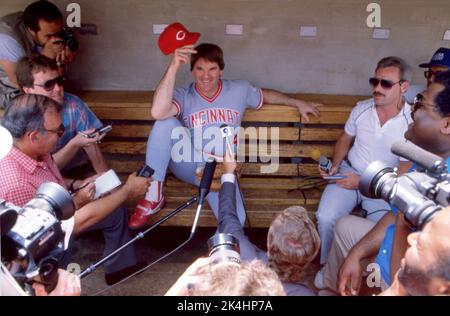 Pete Rose, player manager of the Cincinnati Reds, meets with the press before a game against the Chicago Cubs at Wrigley Field,   ca. 1985 Stock Photo