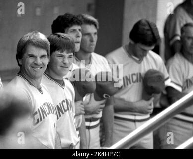 Pete Rose manager / player of the Cincinnati Reds stands next to his son, Pete Rose, Jr. during the national anthem at Wrigley Field,  ca. 1985 Stock Photo