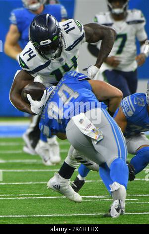 DETROIT, MI - OCTOBER 02: Seattle Seahawks wide receiver DK Metcalf (14) gets stopped quickly by Detroit Lions linebacker Malcolm Rodriguez (44) after a catch during the game between Seattle Seahawks and Detroit Lions on October 2, 2022 at Ford Field in Detroit, MI (Photo by Allan Dranberg/CSM) Credit: Cal Sport Media/Alamy Live News Stock Photo