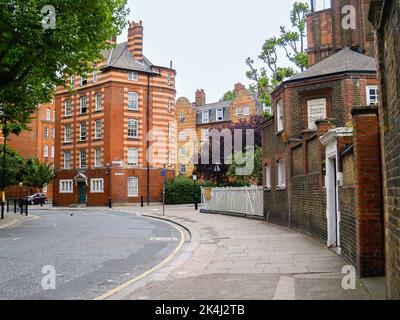 London England - June 15 2009; London suburban street with traditional brick architecture. Stock Photo