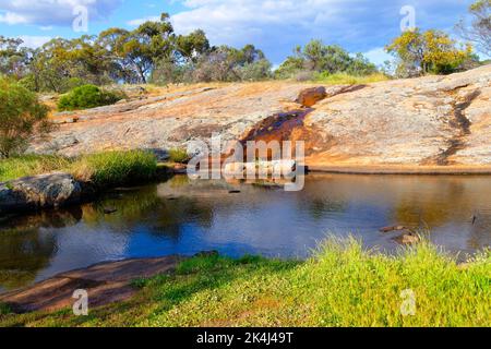 Petrudor Rocks and water hole and Granite Stone landscape, Dalwallinu shire, Western Australia Stock Photo