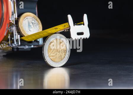 Euro coins and measure tape with copy space, concept of inflation and rising prices Stock Photo