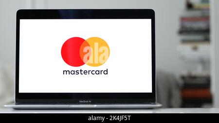 The logo of MASTERCARD visible on a laptop screen traded worldwide Banking company Stock Photo