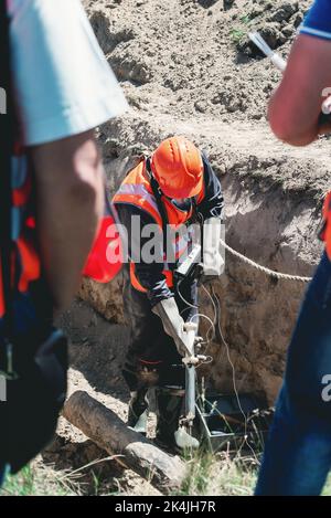 Mechanical engineer checking and inspect gas concentration in a place of possible outflow. maintenance services Stock Photo