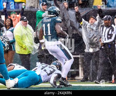 Philadelphia Eagles' A.J. Brown scores a touchdown in front of