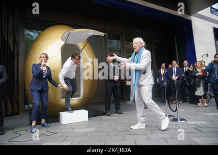 Actor Sir Ian McKellen and comedian John Bishop outside the Londoner Hotel, in Leicester Square, London, for the announcement of a UK tour of the pantomime Mother Goose. The production will star Sir Ian as Mother Goose, with comedians John Bishop and Mel Giedroyc, and will open at the Theatre Royal Brighton on December 3, before a season in the West End at the Duke of York's Theatre, followed by a UK tour. Picture date: Monday October 3, 2022. Stock Photo