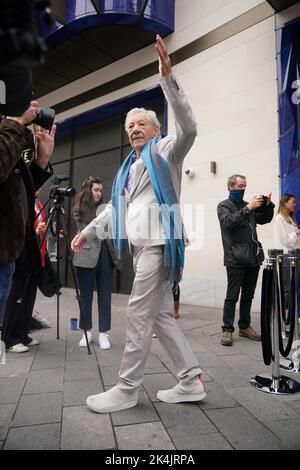 Actor Sir Ian McKellen outside the Londoner Hotel, in Leicester Square, London, for the announcement of a UK tour of the pantomime Mother Goose. The production will star Sir Ian as Mother Goose, with comedians John Bishop and Mel Giedroyc, and will open at the Theatre Royal Brighton on December 3, before a season in the West End at the Duke of York's Theatre, followed by a UK tour. Picture date: Monday October 3, 2022. Stock Photo