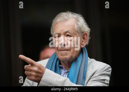 Actor Sir Ian McKellen outside the Londoner Hotel, in Leicester Square, London, for the announcement of a UK tour of the pantomime Mother Goose. The production will star Sir Ian as Mother Goose, with comedians John Bishop and Mel Giedroyc, and will open at the Theatre Royal Brighton on December 3, before a season in the West End at the Duke of York's Theatre, followed by a UK tour. Picture date: Monday October 3, 2022. Stock Photo