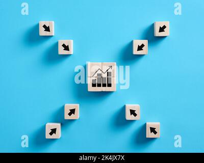 Arrows pointing towards an ascending or increasing business chart or graph. Economic growth, financial profitability or sales increase concepts. Stock Photo