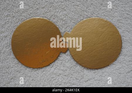 Two golden speech bubbles on a textured red background. Stock Photo