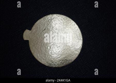 Two golden speech bubbles on a textured red background. Stock Photo