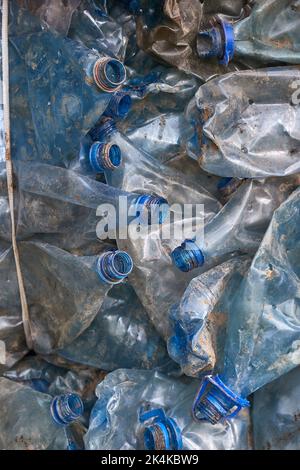 Plastic bottles in bales for waste recycling Stock Photo