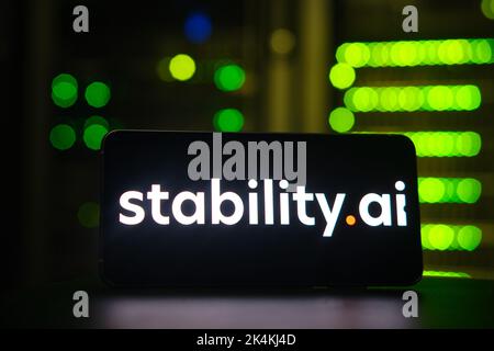 Logo stability ai on the phone screen on the background of the server room. Smartphone with artificial intelligence neural network logo - Moscow, Russ Stock Photo