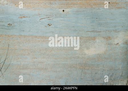 Blue painted wooden surface is old and weathered. Stock Photo