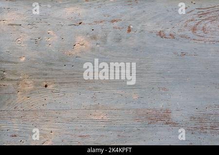 Blue painted wooden surface is old and weathered. Stock Photo