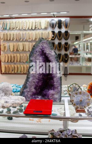 Amethyst cluster or Amethyst crystal stand up selling in stone market. Large deep purple to violet amethyst geode for sell. Used for home decoration o Stock Photo