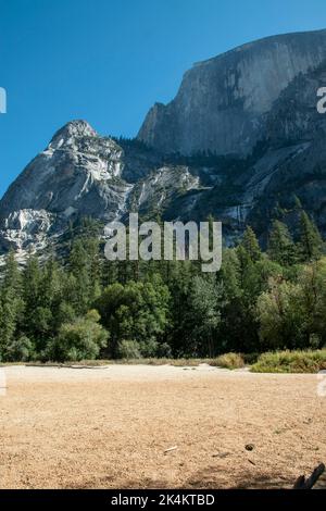 Mirror Lake sits at the base of Half Dome in Yosemite National Park, CA ...