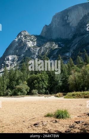 Mirror Lake sits at the base of Half Dome in Yosemite National Park, CA ...