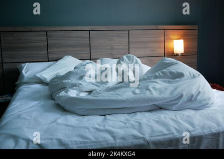 messy bed in early morning , messy bed after waking up  Stock Photo