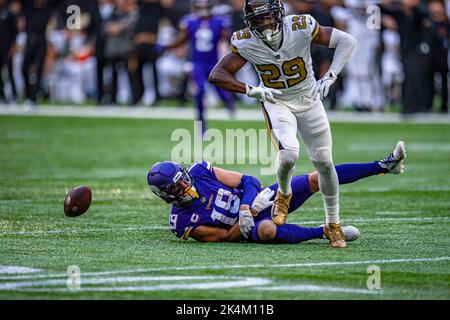 Minnesota Vikings' Adam Thielen (left) celebrates scoring his team's first  touchdown with his team-mate Minnesota Vikings' David Morgan II (right)  during the International Series NFL match at Twickenham, London Stock Photo  