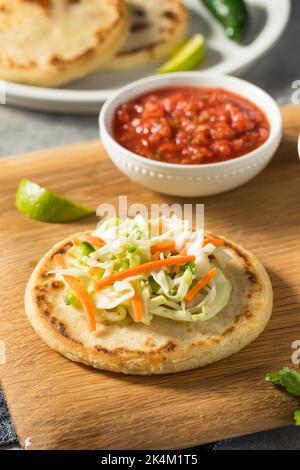 Homemade Salvadoran Corn Pupusas with Curtido and Salsa Stock Photo