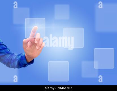 A female hand presses a holographic button Stock Photo