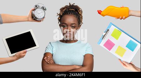 Angry millennial black woman having difficulties with daily routine Stock Photo