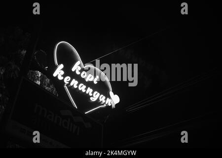 Cicalengka, West Java, Indonesia - 27 September, 2022 : Monochrome photo of neon lights from the drink brand sign 'Kopi Kenangan' Stock Photo