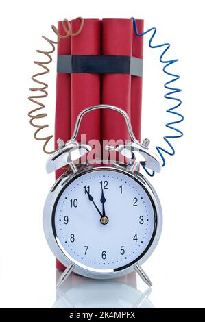 Time bomb, alarm clock attached to dynamite sticks, symbolic image Stock Photo