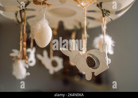 Home interior with easter decor, easter eggs on a light background Stock Photo
