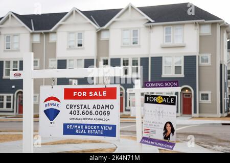 Houses for sale in a new subdivision in Airdrie, Alta., Friday, Jan. 28, 2022. The Calgary Real Estate Board says home sales in the Alberta city for September were down nearly 12 per cent compared with the same month last year. The board says home sales totalled 1,901 for the month as sales of detached homes fell 23 per cent compared with a year ago and sales of semi-detached homes pulled back 27 per cent. THE CANADIAN PRESS/Jeff McIntosh Stock Photo