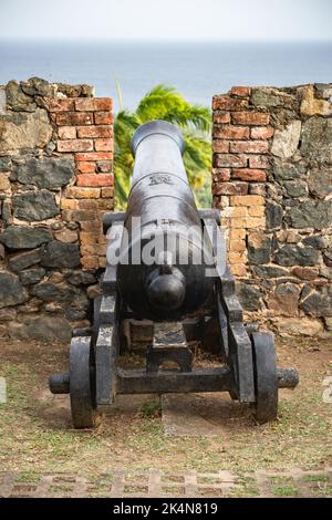 Medieval canon at Fort King George Scarborough Tobago local turism attraction Stock Photo