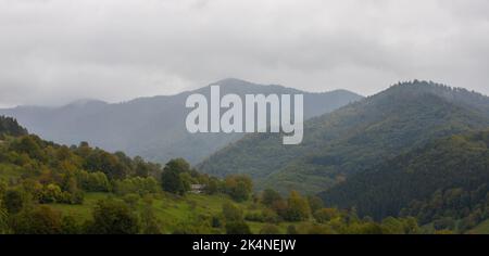 Foggy morning landscape in a hilly area of Transylvania, mountains Stock Photo