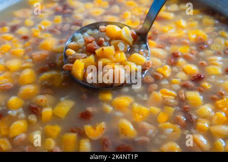 Asure or Noah's Pudding. Homemade traditional Turkish dessert asure. Muslim culture in Turkey background photo. Stock Photo