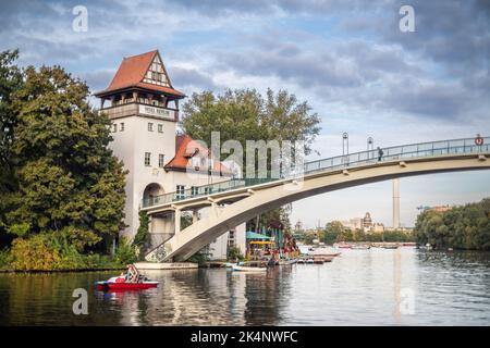 Abteibrücke (Abbey bridge) over the river Spree leading to the Island of Youth (Insel der Jugend) during autumn, Berlin Treptow, Germany, Europe Stock Photo