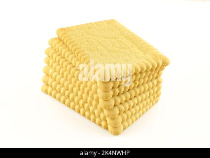Stacked buttery biscuits isolated on white background Stock Photo