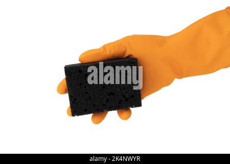 hand in orange glove holds sponge for dis hwashing isolated on white background, close-up copy Stock Photo