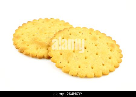 Two round salty crackers isolated on white background Stock Photo