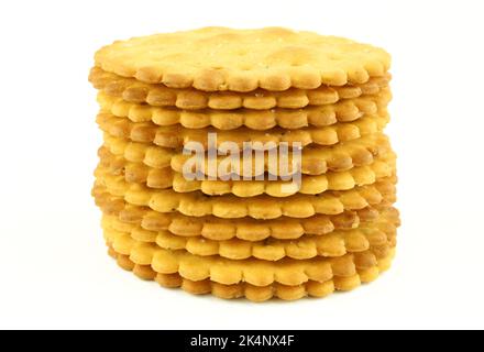 Stack of round salty crackers isolated on white background Stock Photo