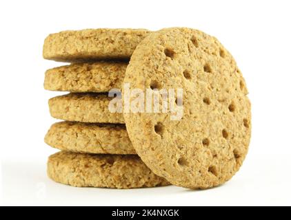 Stacked oat cereal cookies isolated on white background Stock Photo