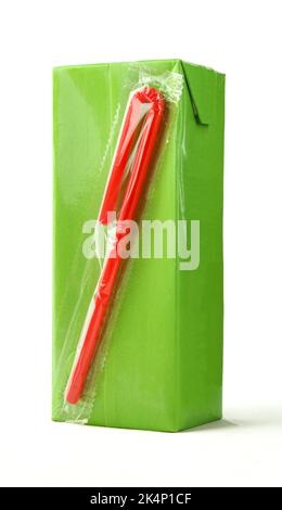 Green carton juice box with red plastic straw attached isolated on white background Stock Photo