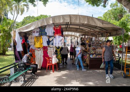 Market selling traditional clothes and handicraft on the city of Merida in Mexico Stock Photo