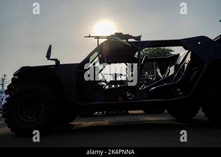 Surabaya, August 2022. Silhouette of military suv car with back light of sunlight Stock Photo