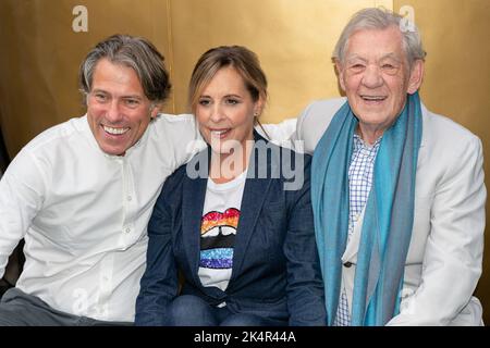 London, UK. 03rd Oct, 2022. (L-R) John Bishop, Mel Giedroyc, and Ian McKellen pose in front of a giant golden egg. Sir Ian McKellen, John Bishop, and Mel Giedroyc Launched the UK and Ireland tour of Mother Goose outside The Londoner Hotel in London. Mel Giedroyc hosted the event to announce the cast for the show. To mark the occasion Ian McKellen and John Bishop hid in a big golden egg placed outside and Mel opened the hatch on the egg to reveal the pair that have been cast. Credit: SOPA Images Limited/Alamy Live News Stock Photo