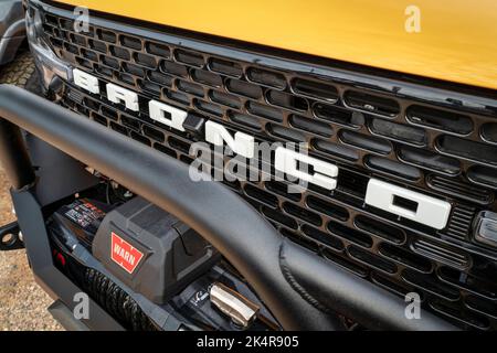 Loveland, CO, USA - August 26, 2022: Grille and front bumper of Ford Bronco Sport SUV with Warn winch. Stock Photo