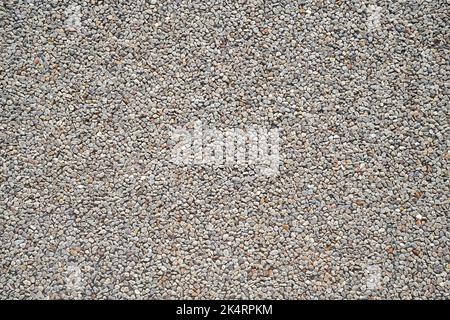 Pattern of gravel on road, grey stone pebbles background Stock Photo
